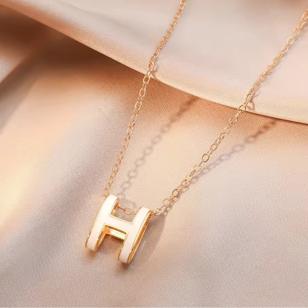 Gold-Tone Necklace with White Enamel 'H' Pendant
